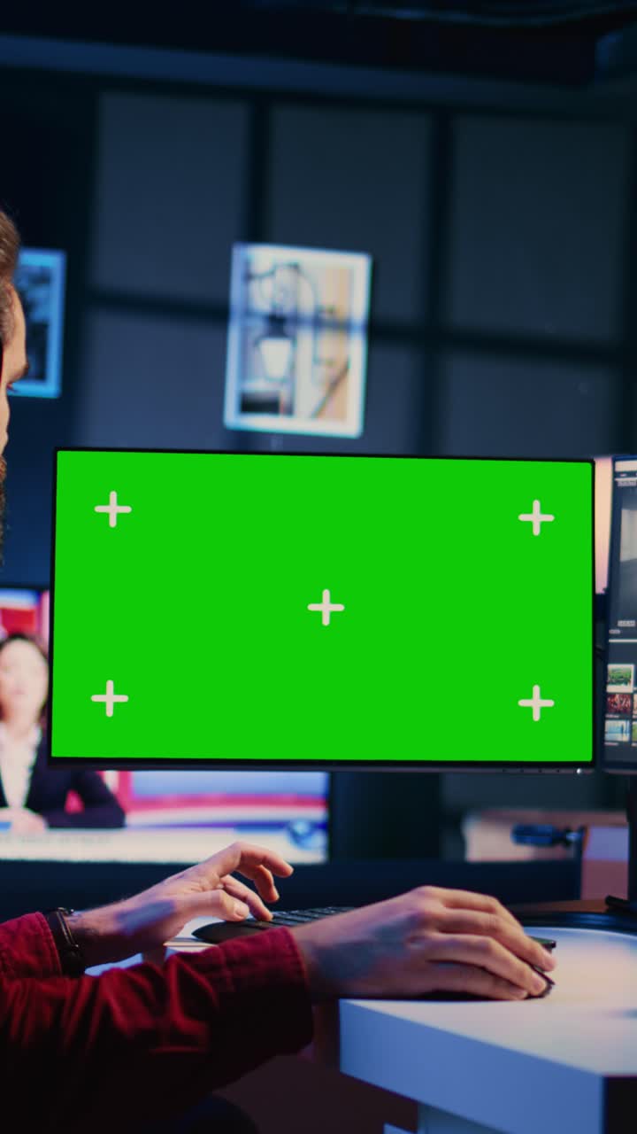 Vertical video Photo editor selecting best photographs using retouching application on chroma key display