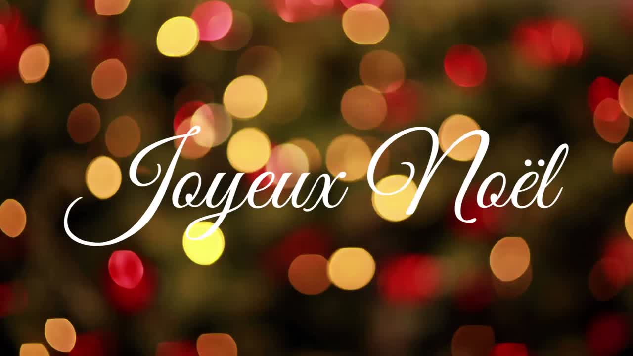 Joyeux No&Atilde;&laquo;l written over flickering lights