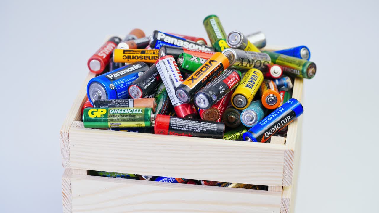Used batteries from different manufacturers, waste, collection and recycling.