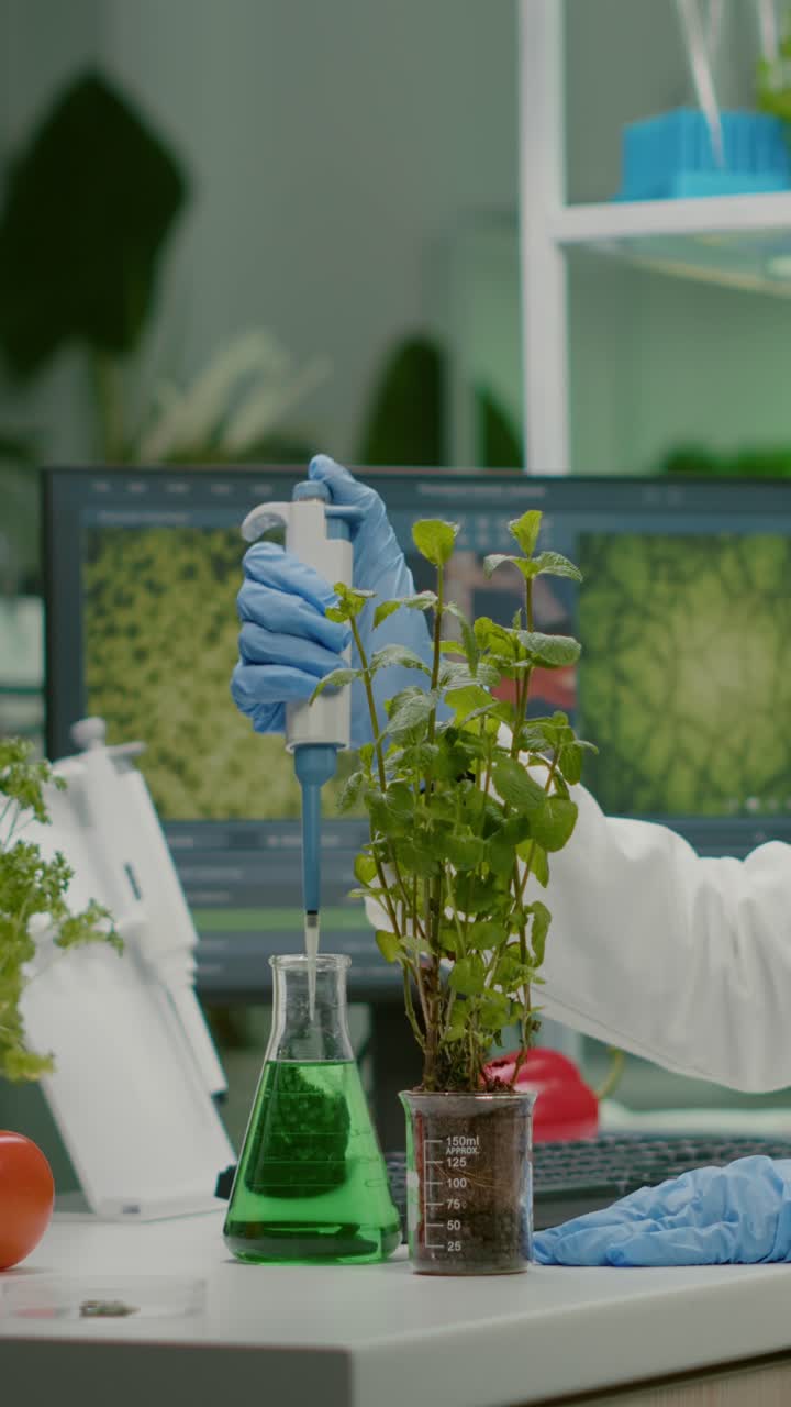 Scientist conducting plant research in a laboratory