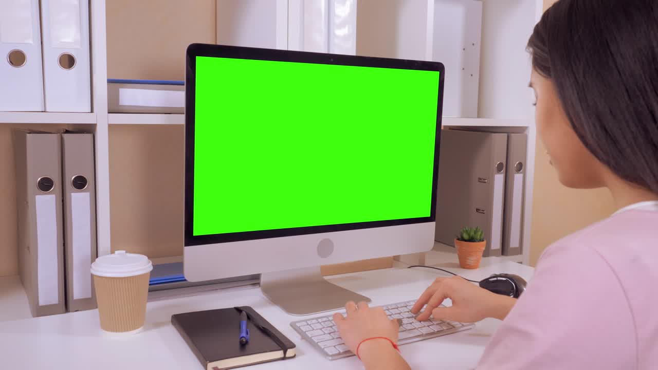 worker entering data on pc