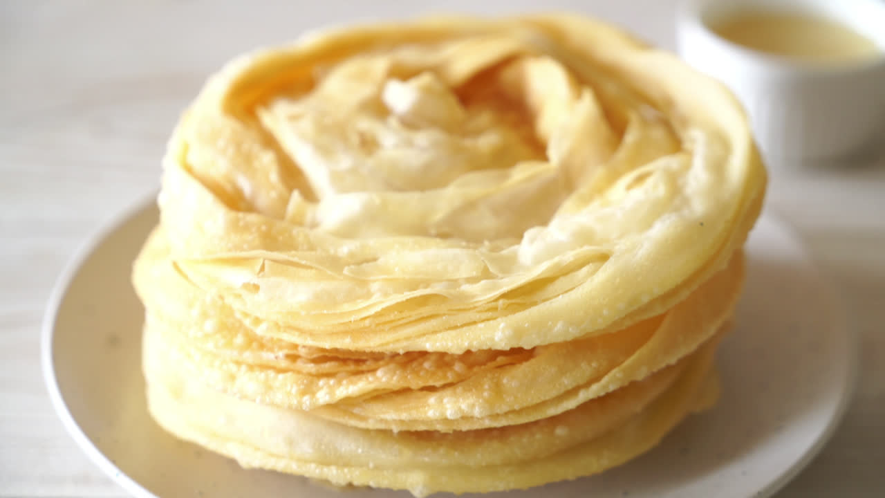 fried crispy roti dough with sweetened condensed milk
