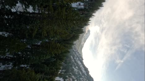 mountain winter landscape in american fork canyon in utah, fpv aerial view