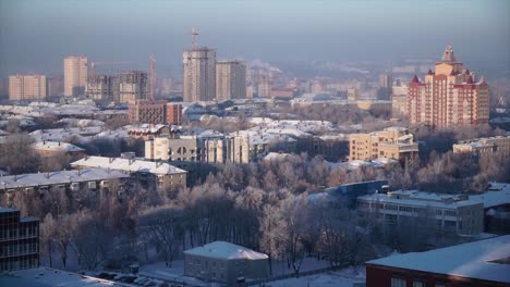 snowy cityscape at sunrise