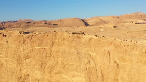 aerial view of the ancient masada fortress and the surrounding desert landscape