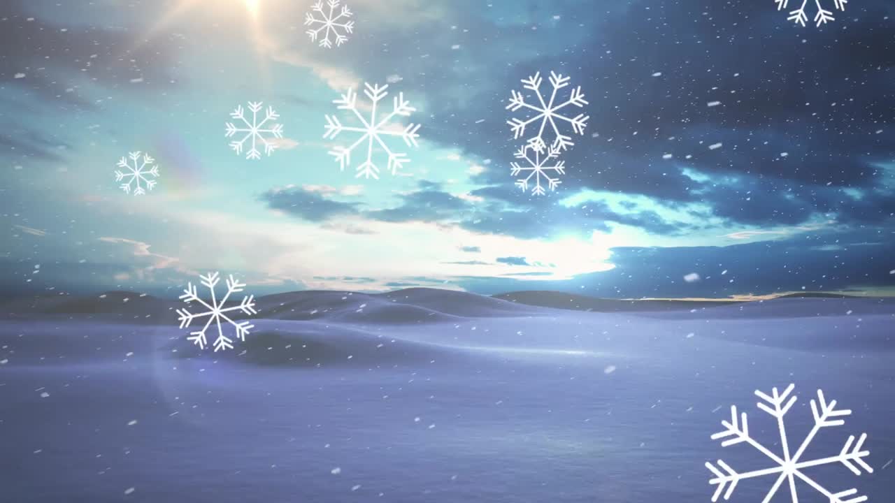 하늘의 구름에 맞서 겨울 풍경에 떨어지는 눈송이