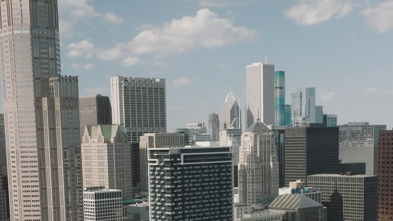 View of Chicago skyline from above with buildings under blue sky
