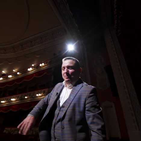 inspirational male speaker does presentation of new technological product. motivational speaker