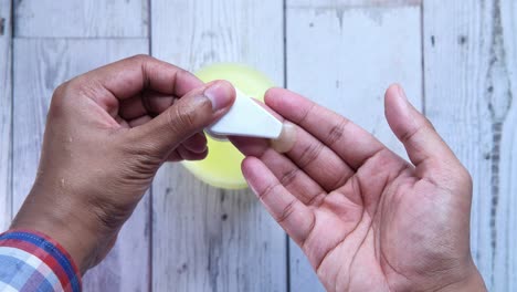 washing hands with liquid soap