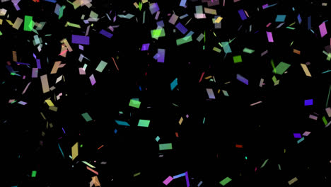 confeti colorido sobre un fondo negro