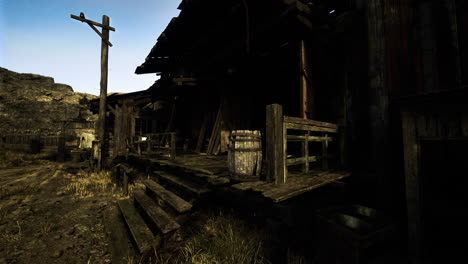old wooden building in a rural setting with overgrown pathways and barrels