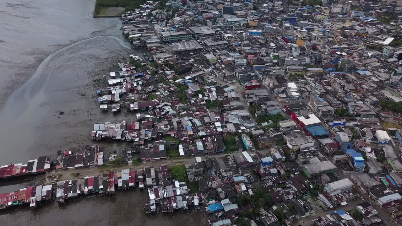 Aerial shot showing port and slum in Buenaventura, Coombia