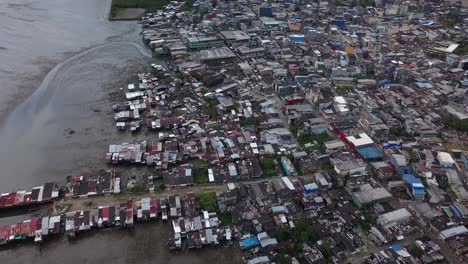 aerial shot showing port and slum in buenaventura, coombia