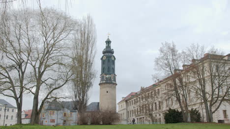 the tower of weimar city castle on cold and cloudy day in winter