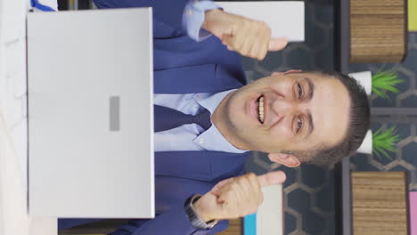 Vertical-video-of-Excited-businessman-clapping-at-camera.