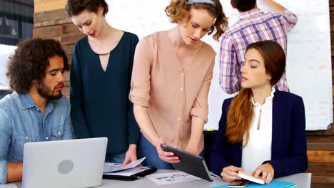 Group-of-executives-having-a-discussion-in-the-conference-room