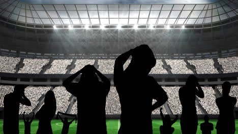 animation of silhouettes of disappointed sports fans over sports stadium