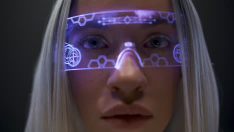 futuristic vr goggles youngster face closeup. girl playing online videogame