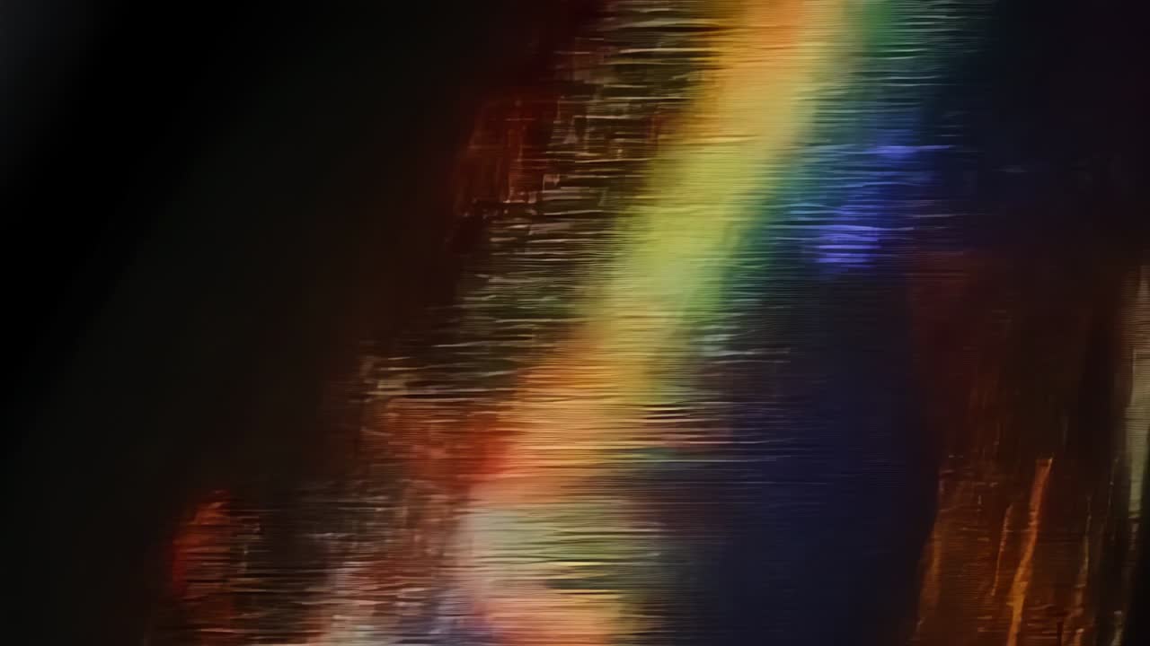 Initial shimmering serrated lines shifting on dark screen display forming pixelated glitch ribbon