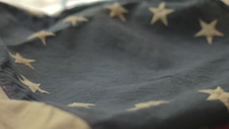 detail of american flag with 13 stars of the revolution