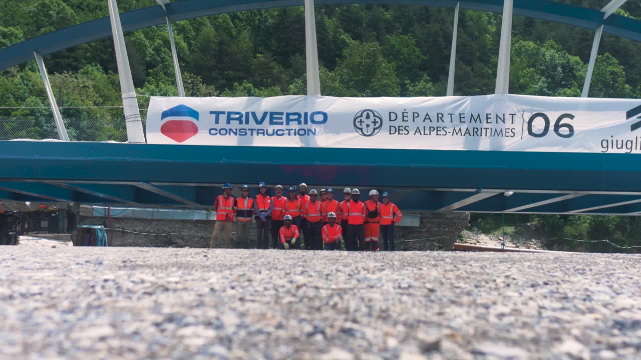 Construction Workers Posing Under a New Bridge in France