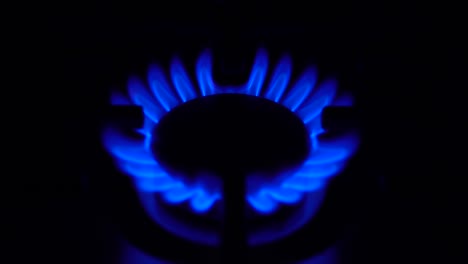 the gas burner turns on in the dark. stove works at the household gas. the flame is blue.