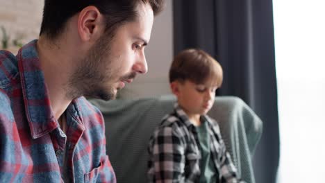 Video-of-single-father-with-his-son-at-home-fishing