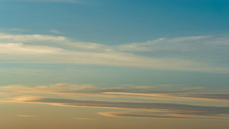 colorful sky with wispy clouds at sunset or sunrise