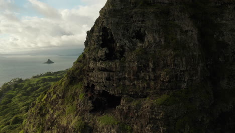 drone aerial cliffside reveal at chinaman's hat