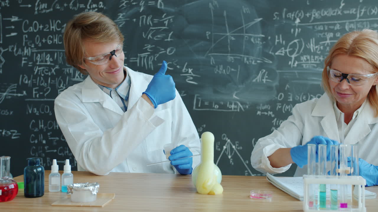Scientists Conducting a Chemistry Experiment