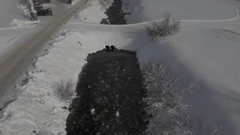 Stunning-Livigno-Alps-drone-video:-snow-peaks,-city-and-mountain-town,-ideal-for-high-quality-winter-and-tourism-ads