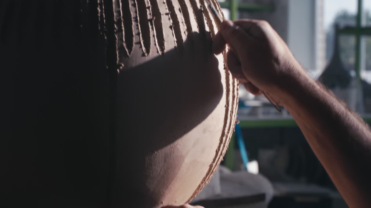 Sculpting a Clay Vase