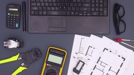 lap top, architecture and construction tools move on work table stop motion