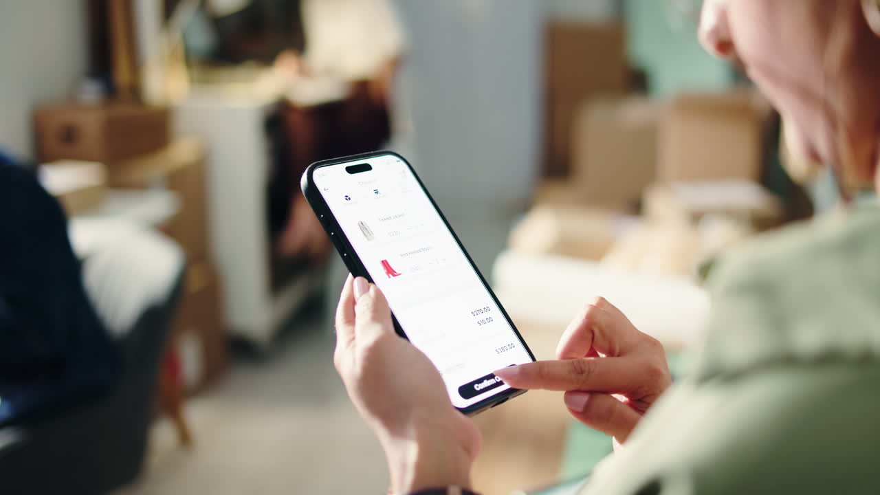 Person's Hands Using Smartphone for Online Shopping and Payment