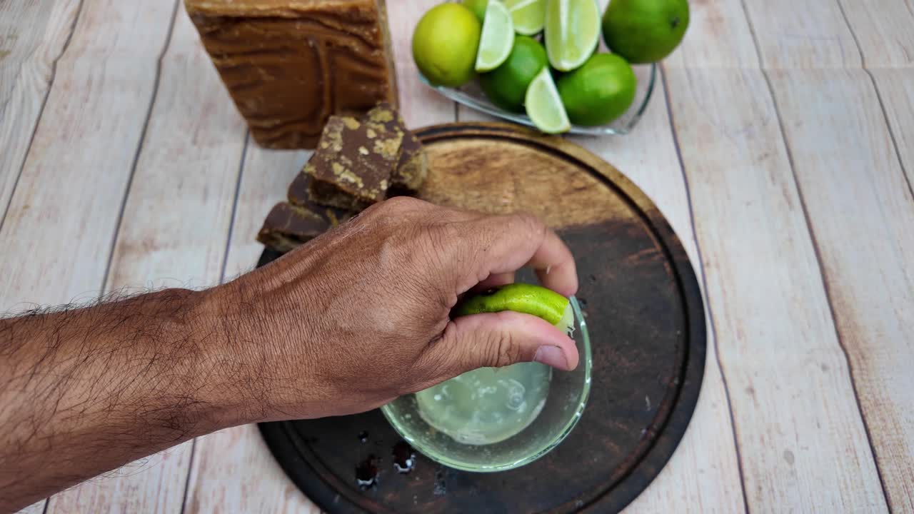 Close-up of a rustic preparation of Panela tea, highlighting natural ingredients, healthy food