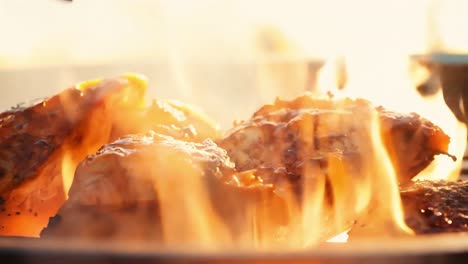 grilled chicken on fire