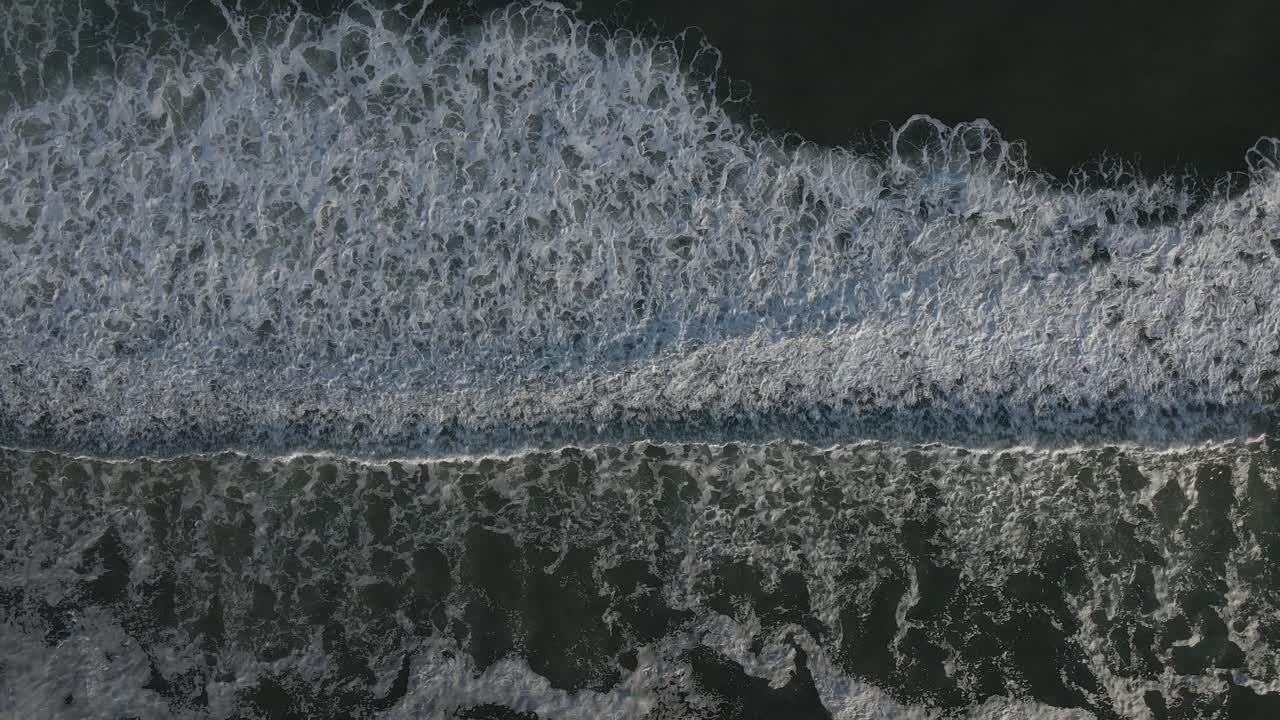 Top Down Aerial View Of Sea Water Surface, White Foam Waves Texture As Natural Background - aerial static