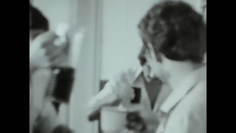 group of people in a black and white video from the soviet union. circa ussr 1980s: a historic black and white video capturing a group of people during the era of soviet union.
