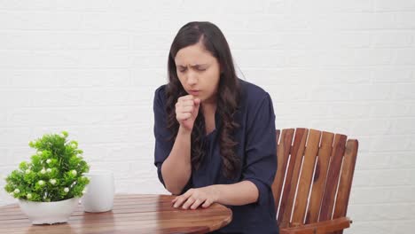 Sick-young-Indian-girl-coughing