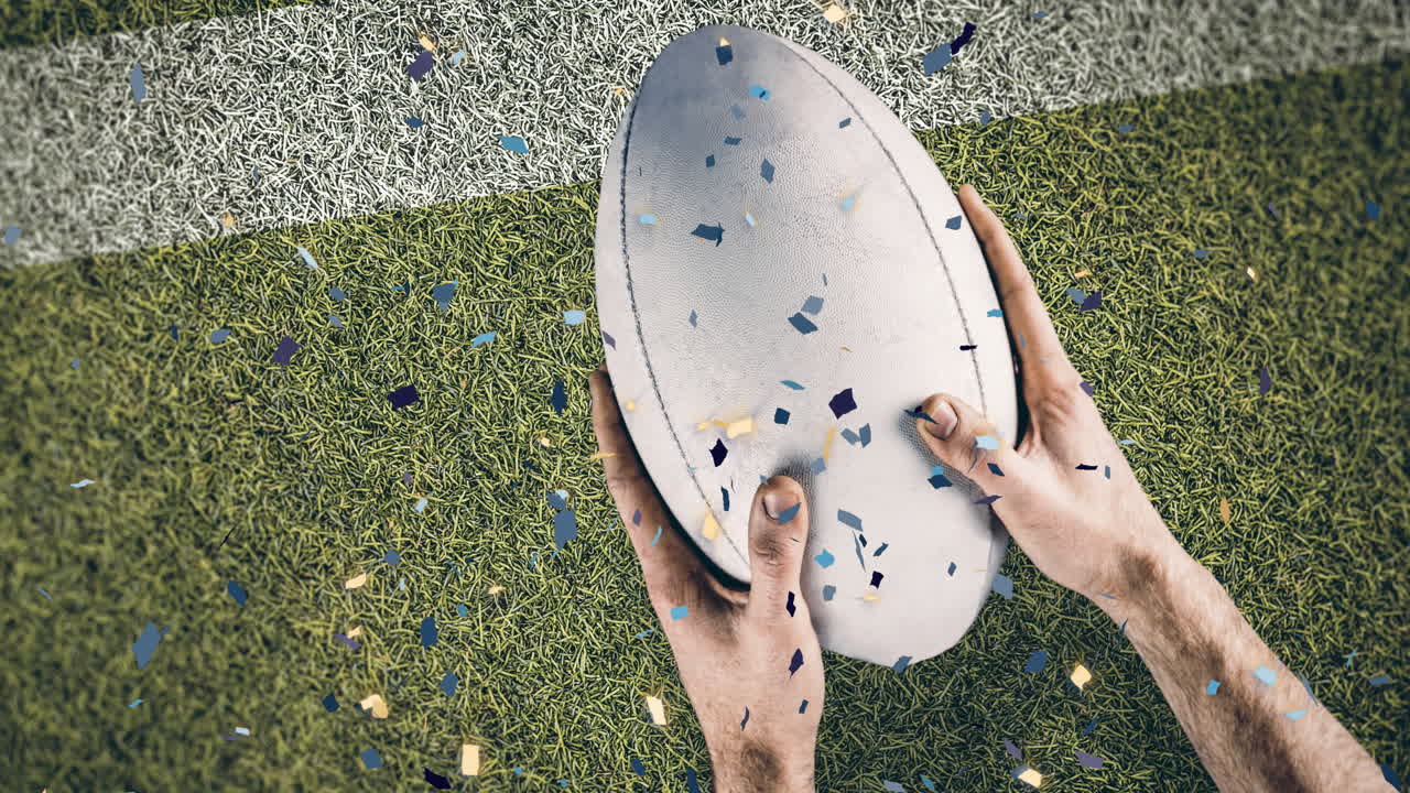 경기장에서 공을 들고 있는 백인 남성 럭비 선수 위에 있는 콘페티의 애니메이션