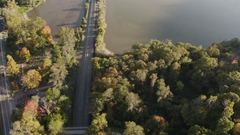 4k-Aerial-pan-up-shot-of-train-track-to-mountain