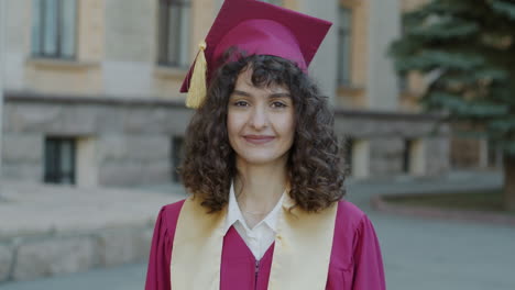 smiling graduate woman