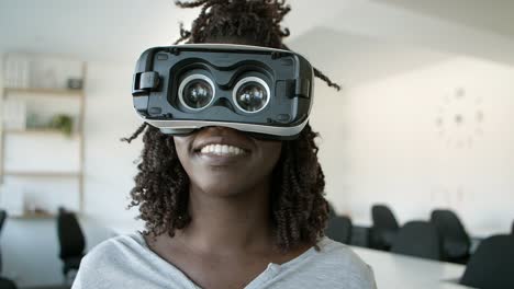 Smiling-African-American-user-with-VR-headset