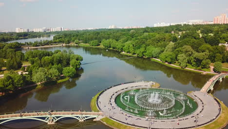 park with fountain and lake