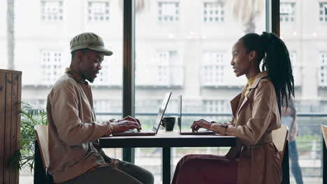 Coffee-shop,-black-man-or-woman-with-a-laptop