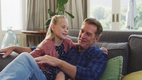 Grandfather-and-granddaughter-spending-time-together-