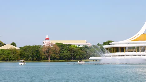 peaceful scene with water fountain and pavilion