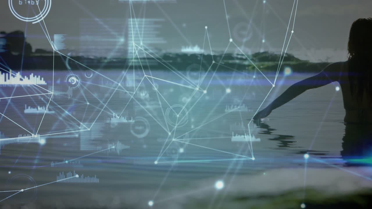 Woman emerging from dusk lake and raising arms to activate data overlay then swimming under surface