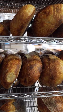 freshly baked bread on metal racks