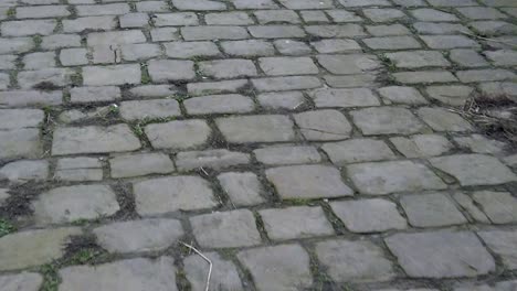 old urban cobblestone pebble pavement stone surface, vintage cobble floor street paving